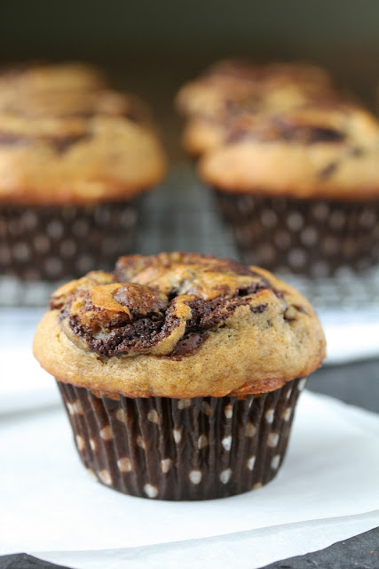 These Banana Chocolate Espresso Swirl Muffins are light and moist, and have a decadent swirl of espresso enhanced chocolate throughout the middle.