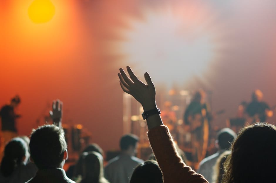 People Raising Hands on Concert