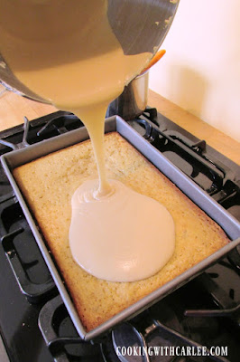 Smooth, sweet and creamy, this caramel frosting is easy to make and is a perfect topper to butter cake, chocolate cake, banana cake and more! pouring caramel frosting over banana cake