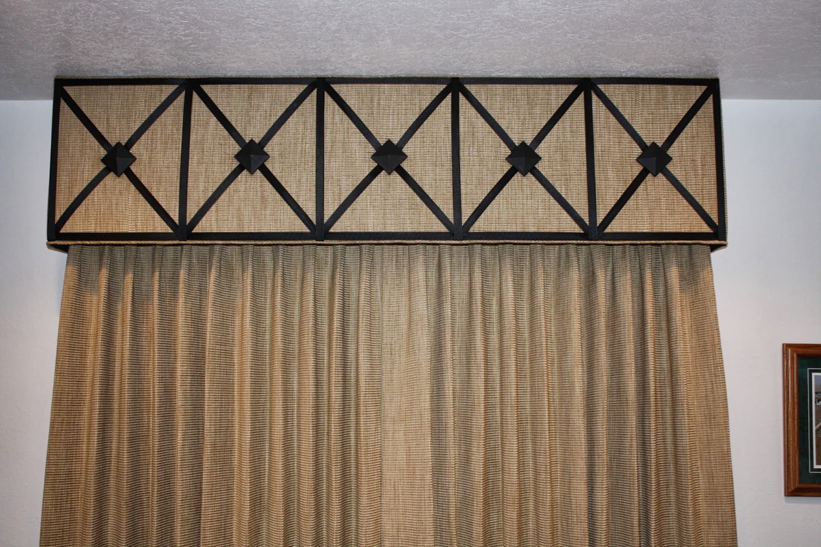 Window Fashions: Cornice board using wrought iron medallions