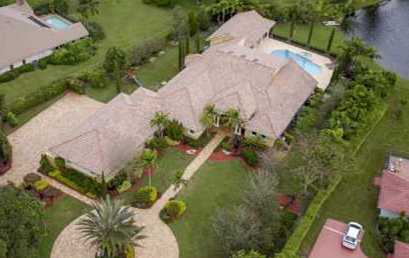 SOLD BY MARILYN: Gorgeous lake home in PARKLAND just below Boca