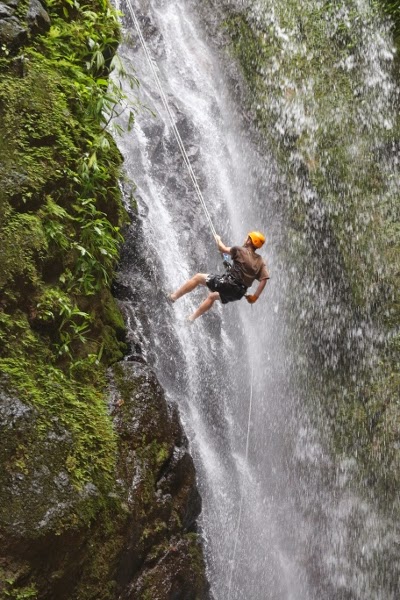 Rapelling down a waterfall in Costa Rica Rapelling down a waterfall in Costa Rica