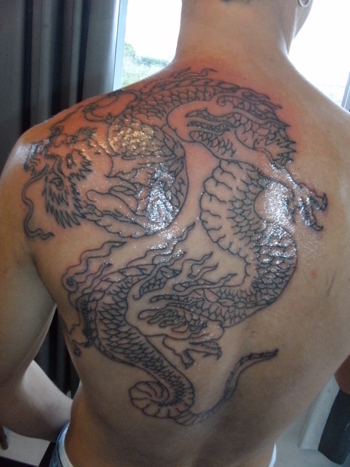 Anderson Tattoo Serrinha tattoo Dragao nas costas