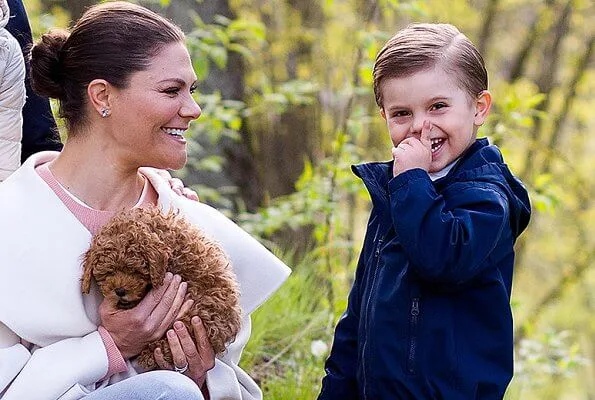 Crown Princess Victoria wore a wool and cashmere blend draped collar jacket by Toteme. Princess Estelle and Prince Oscar