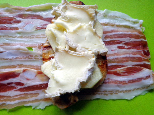 Place chops on pancetta rashers, top with apple and cheese
