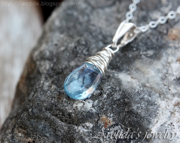 http://www.arctida.com/en/minimalism/49-blue-topaz-necklace-wire-wrapped-sterling-silver-nimue.html