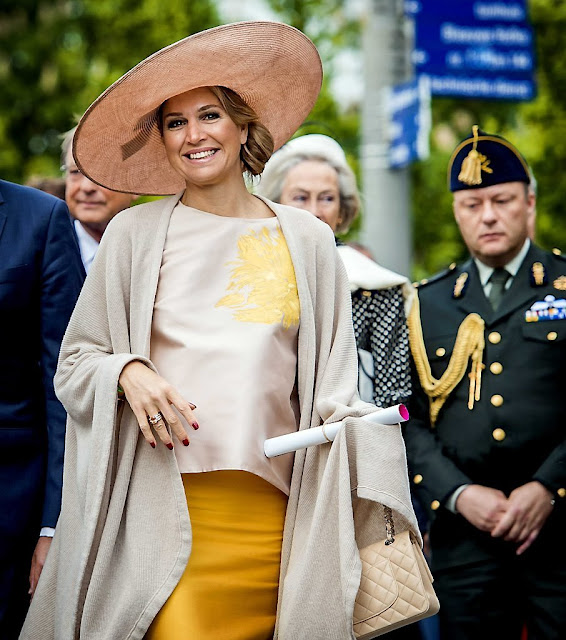 King Willem-Alexander and Queen Maxima visit during an region visit Zeeuws Vlaanderen