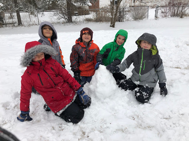 Kids with snowmen