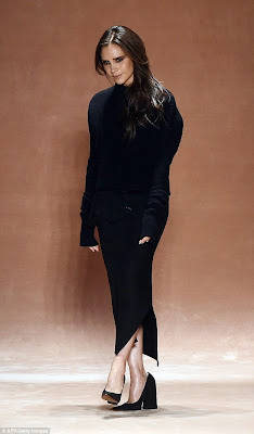Victoria Beckham getting on the catwalk at the fashion show New York 2015