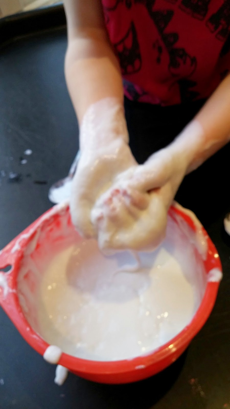 washing hands in slime