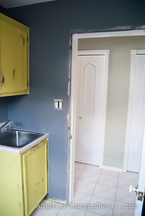 Laundry Room In Progress with Annie Sloan English Yellow // ASwellPlacetoDwell.com