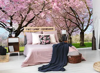 gorgeous bedroom with wall mural of pink flowers in background