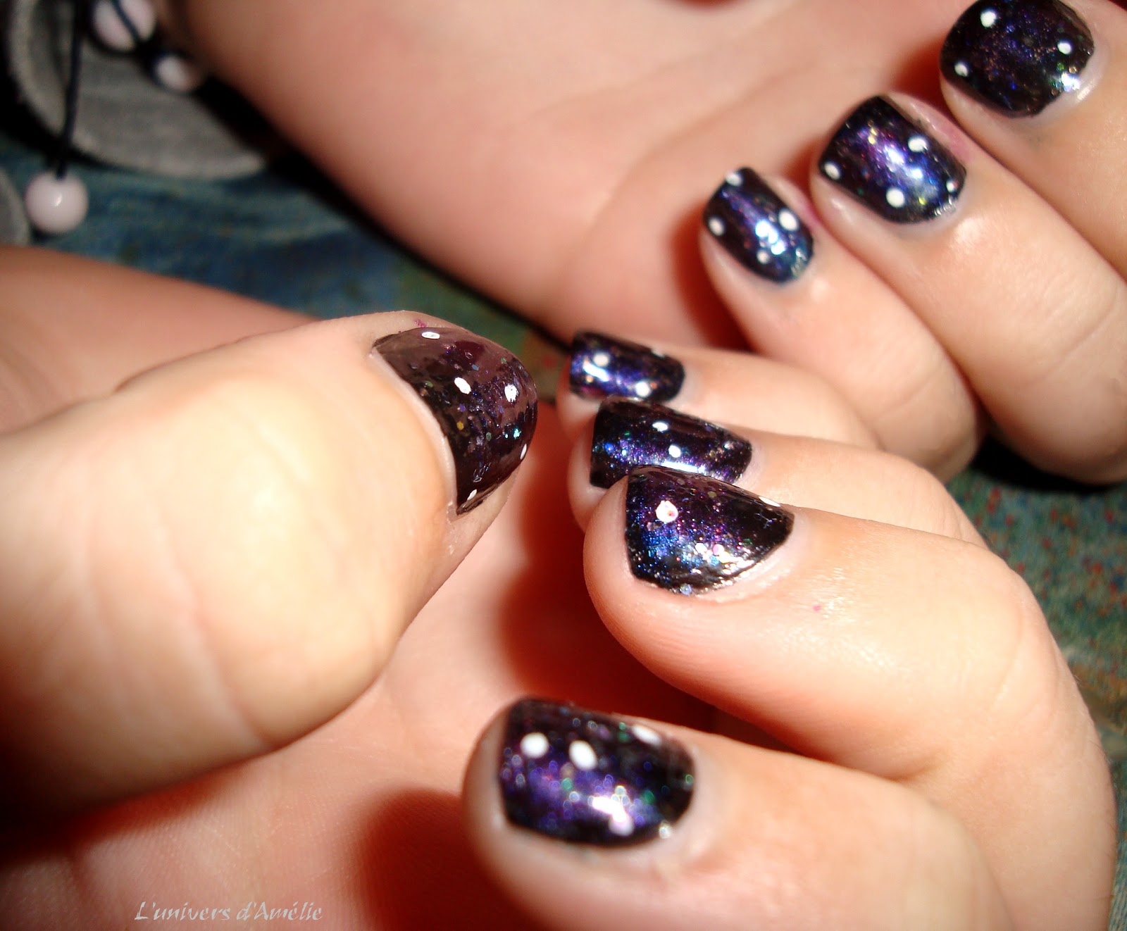 7. Black and Purple Galaxy Nail Art - wide 2