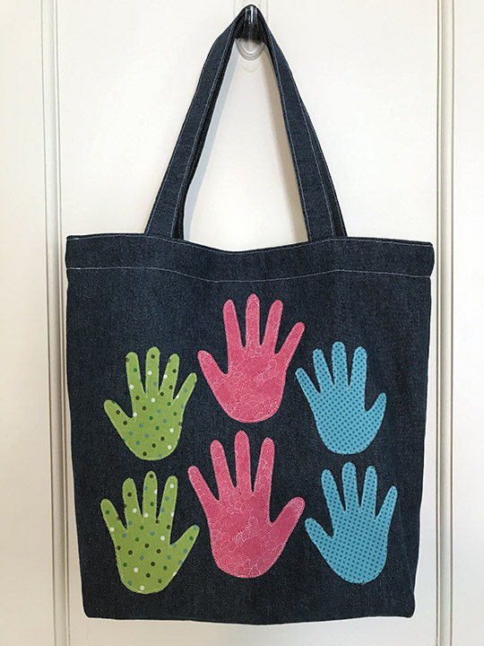 Make a Handprint Tote Bag for Mother's Day. Mom will love it!
