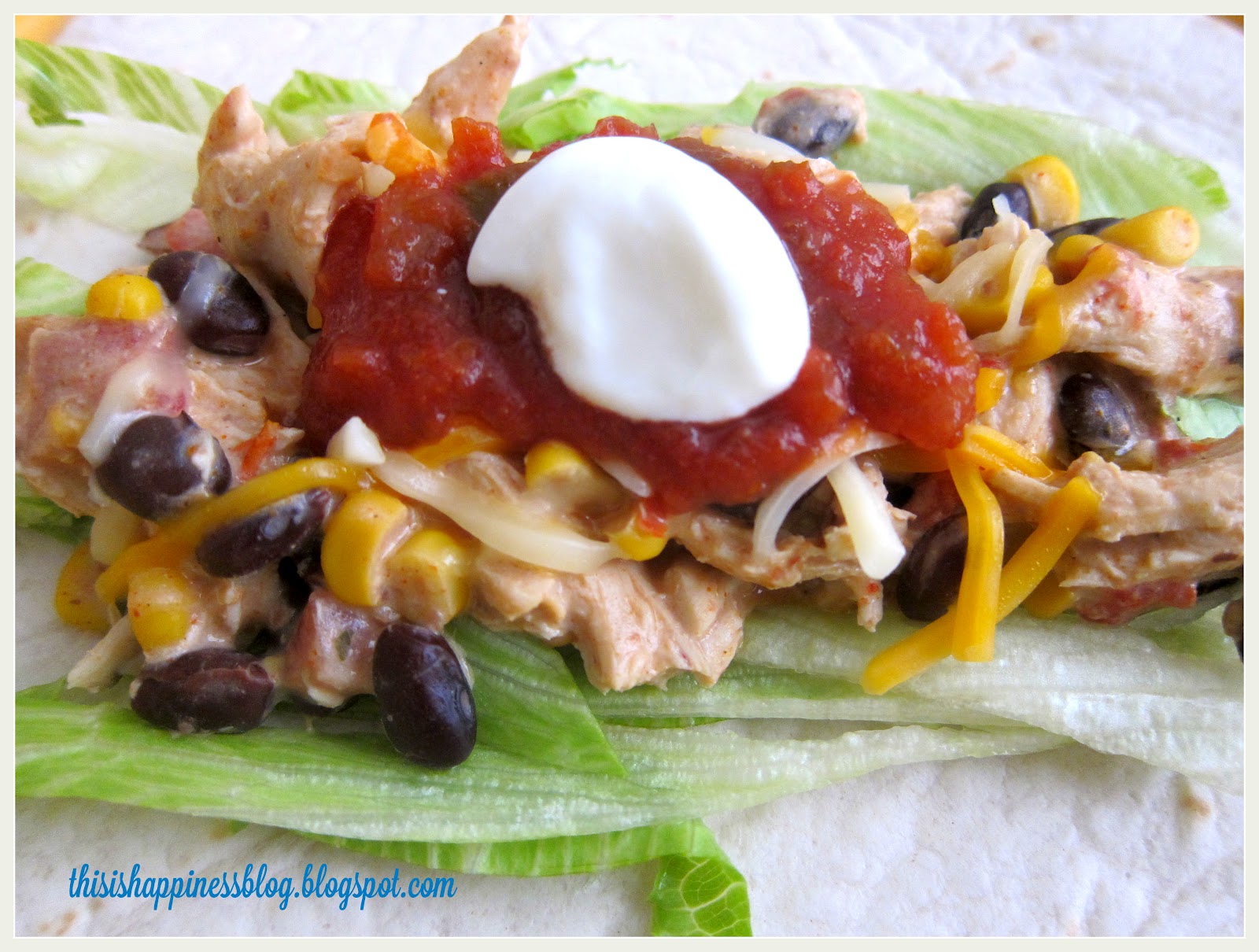 this is happiness cream cheese crockpot burritos