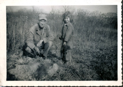 man and girl with shovel 1952