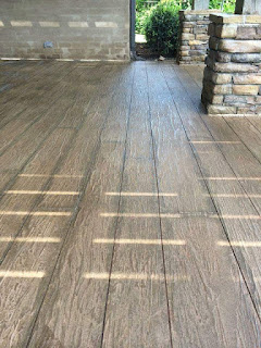 Wood decks need to much maintenance, sand/stain/seal every year...not concrete. Looks like wood, but beats wood in every way! 