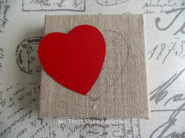 Buttons and Burlap Heart in 3 Easy Steps mythriftstoreaddiction.blogspot.com Simple project created with clearance buttons and burlap sign!