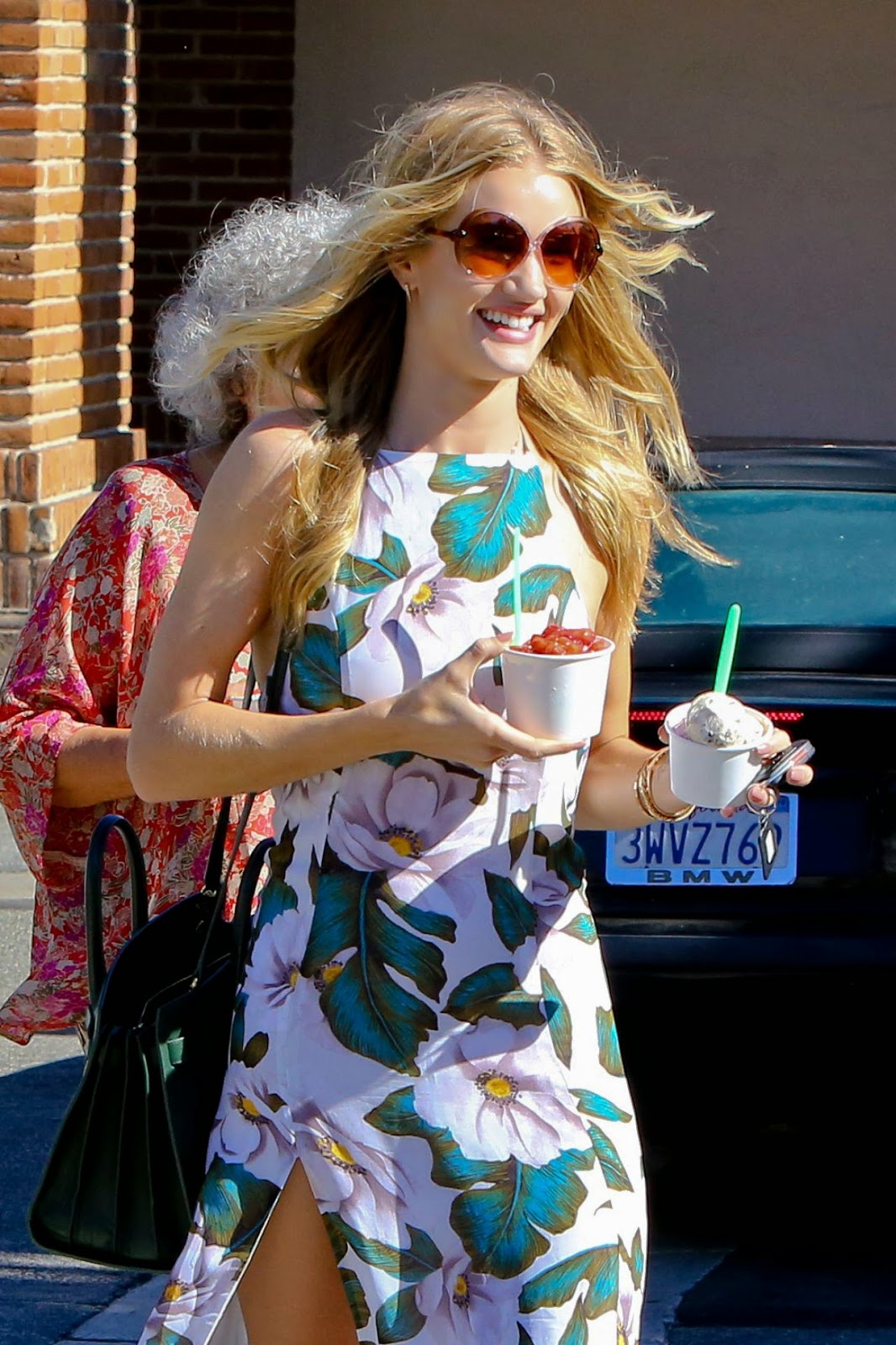 Rosie Huntington-Whiteley pairs floral maxi dress with Givenchy sandals