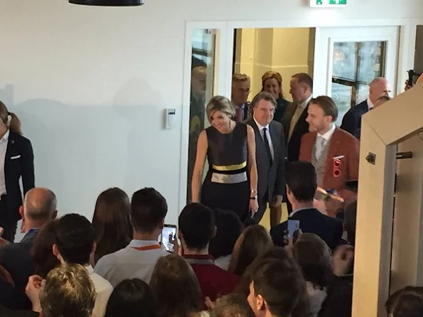 Queen Maxima attends the opening of the StudyPortals in Eindhoven. Queen wore Oscar de la Renta Sleeveless Lame Dress with Feather Hem 