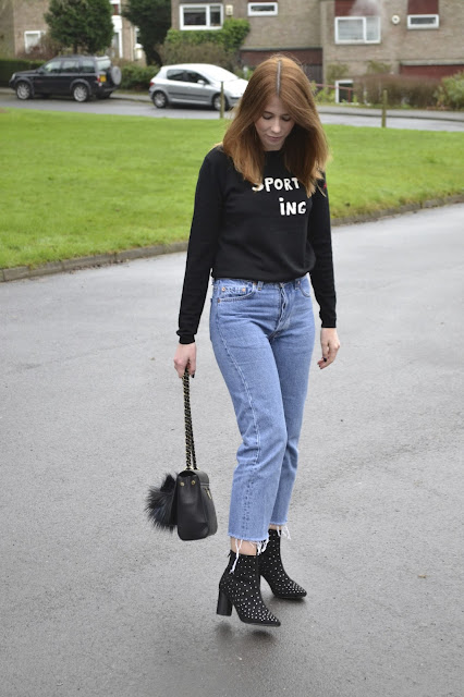 Bella freud jumper from Fred perry, Blue vintage Levis 501 with black studded boots from ASOS. Mulberry style bag with river island pom pom. Affordable women's fashion blog. Alexa chung style. Vogue  