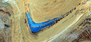boomerang blue in the desert.composition,abstract landscapes ,Abstract Naturalism,abstract photography deserts of Africa from the air,abstract surrealism, ,fantasy forms of stone in the desert abstract landscapes ,Abstract Naturalism,abstract photography deserts of Africa from the air,abstract surrealism,