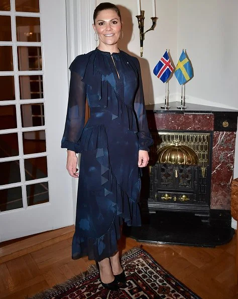 Crown Princess Victoria wore StarStudio PR Baroque pearl earrings, a new printed dress by Rodebjer. HM Dark blue dress