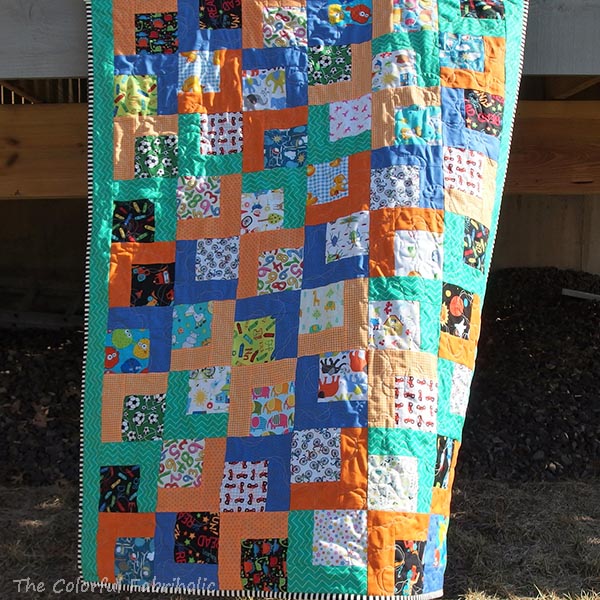 The Colorful Fabriholic Rocking Chair Quilts