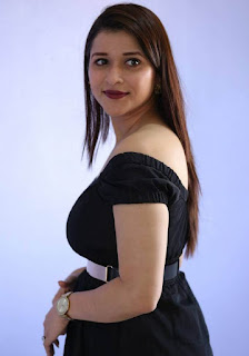 Beautiful Telugu Girl Mannara Chopra Long Hair In Mini Black Dress