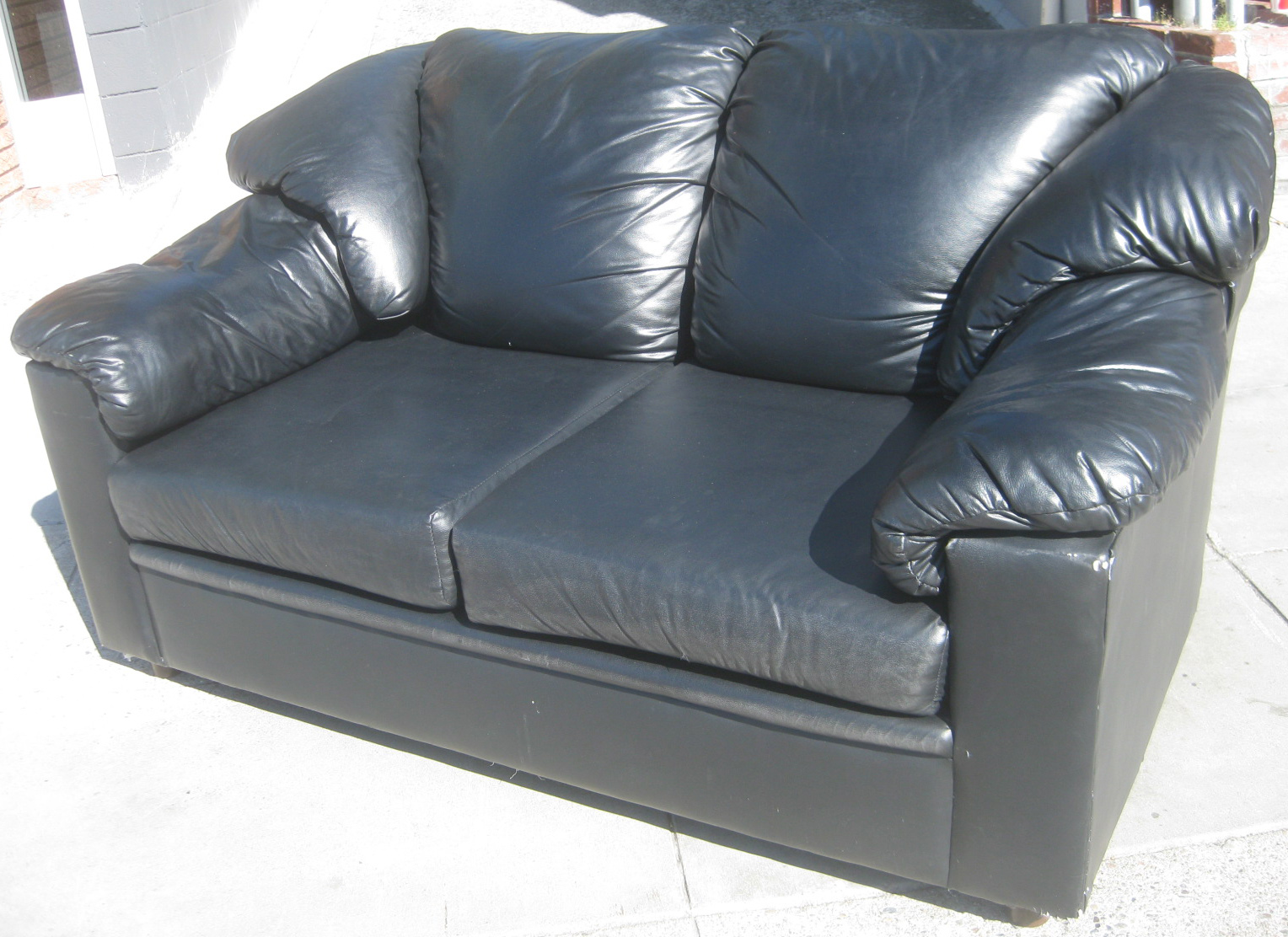 UHURU FURNITURE & COLLECTIBLES SOLD Black Vinyl Loveseat 90