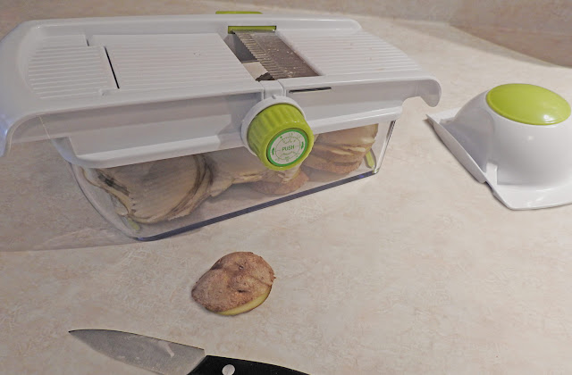 Kitchen slicer with adjustable thicknesses.
