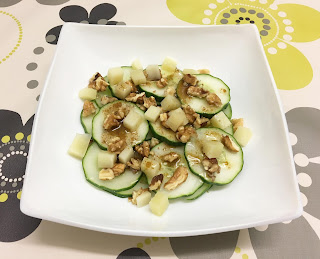 Cucumber salad with cheese and nuts