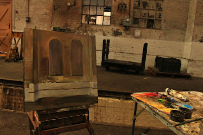 Painting the interior of the Large Erecting Shop, Eveleigh Railway Workshops by industrial heritage artist Jane Bennett