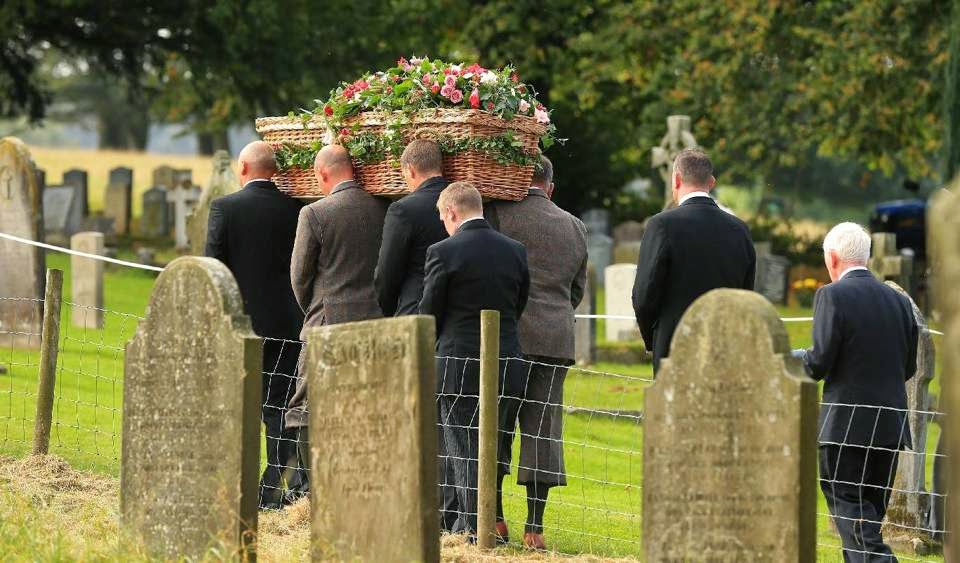 The coffin of Deborah, the Dowager Duchess of Devonshire is carried from St Peter's Church following her funeral service, on the Chatsworth estate, England, 02.10.2014. The last of the famous Mitford sisters, the Dowager Duchess of Devonshire, died at the age of 94.