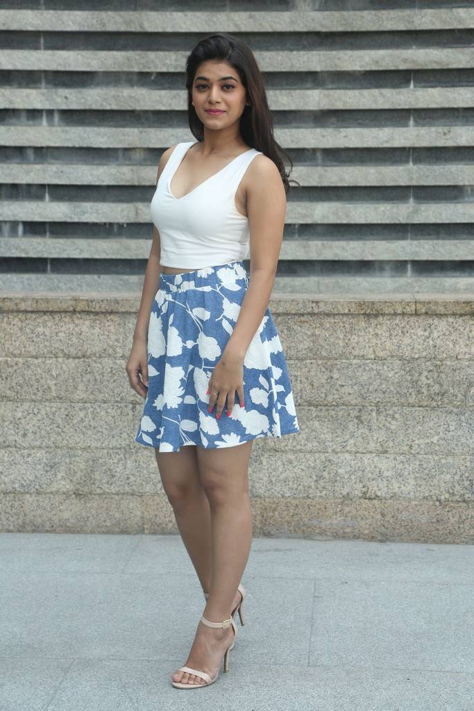 Telugu Actress Yamini Bhaskar Hot Stills In White Mini Skirt