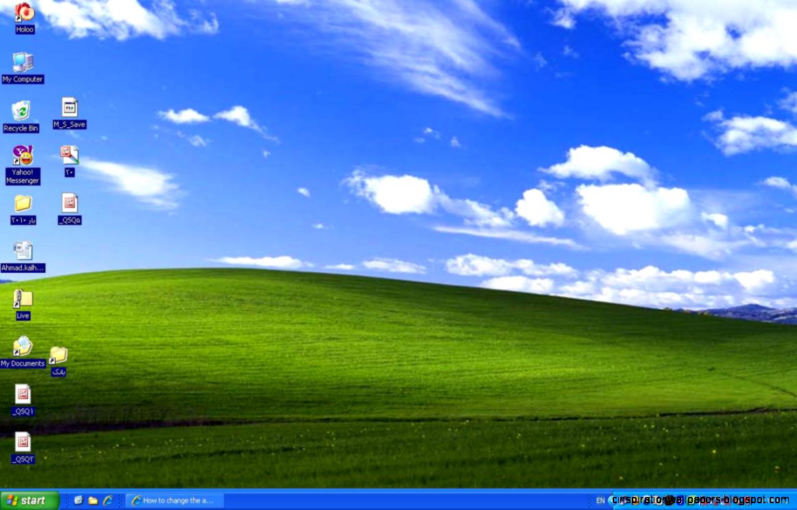 Texts below desktops Icons became blue in Windows XP How can I