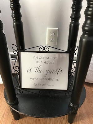 Frame with Ralph Waldo Emerson quote about guests