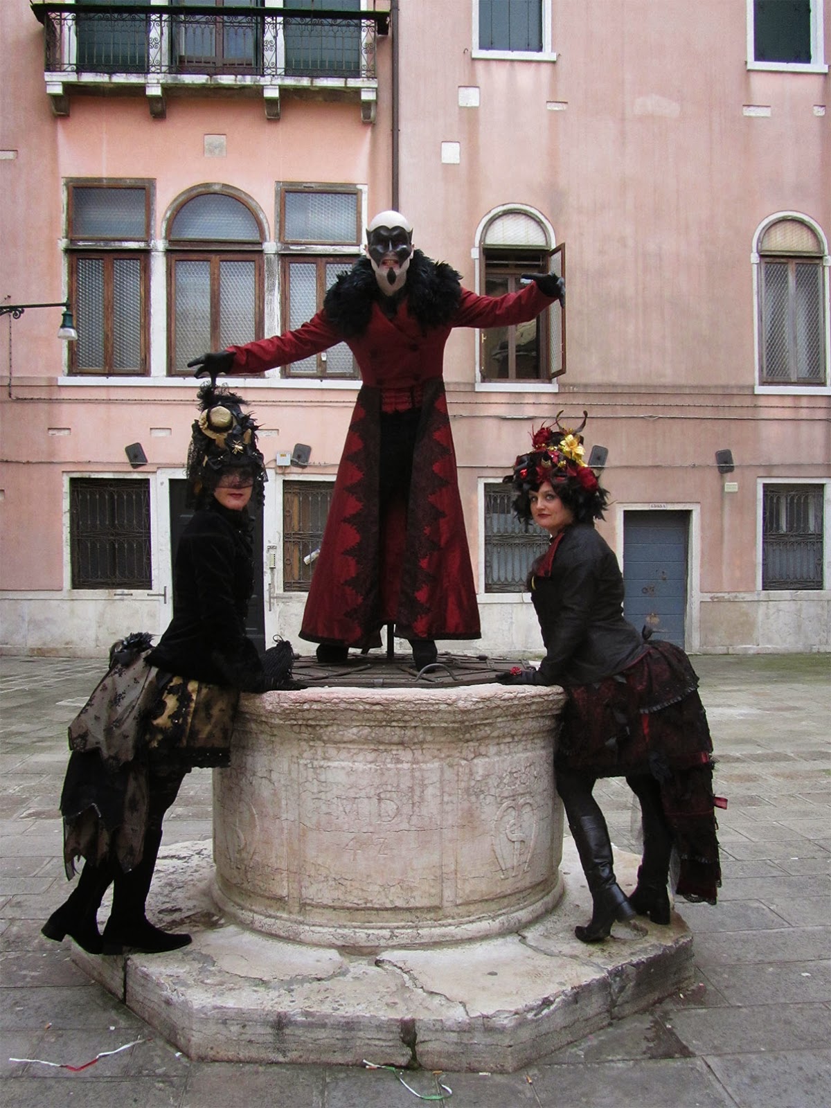 three devils on an old well