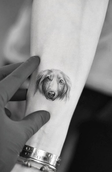 tatuagens femininas de cachorros