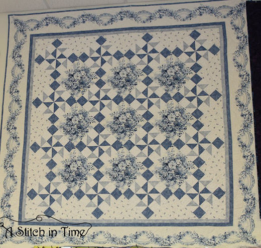 Garden Twist Anniversary Quilt Made by Judy Lowery and Debbie Markham of A Stitch in Time, The Pattern designed by Sharon Evans Yenter for In the Beginning Fabrics