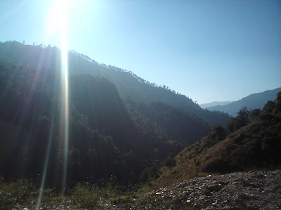 Sun, mountains and sunrise in the Garhwal Himalayas