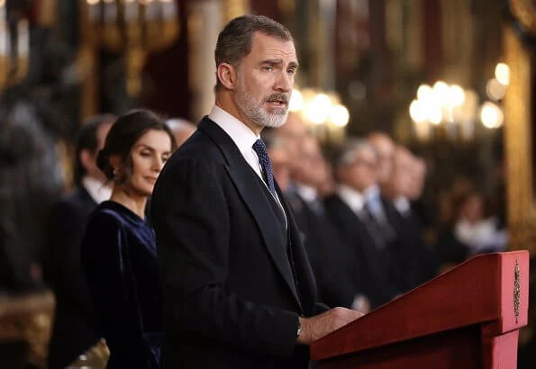 Queen Letizia wore a blue velvet gown by Spanish fashion house Felipe Varela, which she prefers to wear at these kind of events. aquamarine earrings