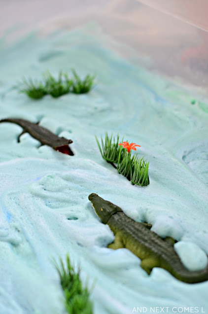 Alligator small world sensory bin with soap foam