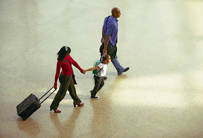 family%2Bwalking%2Bthrough%2Bairport