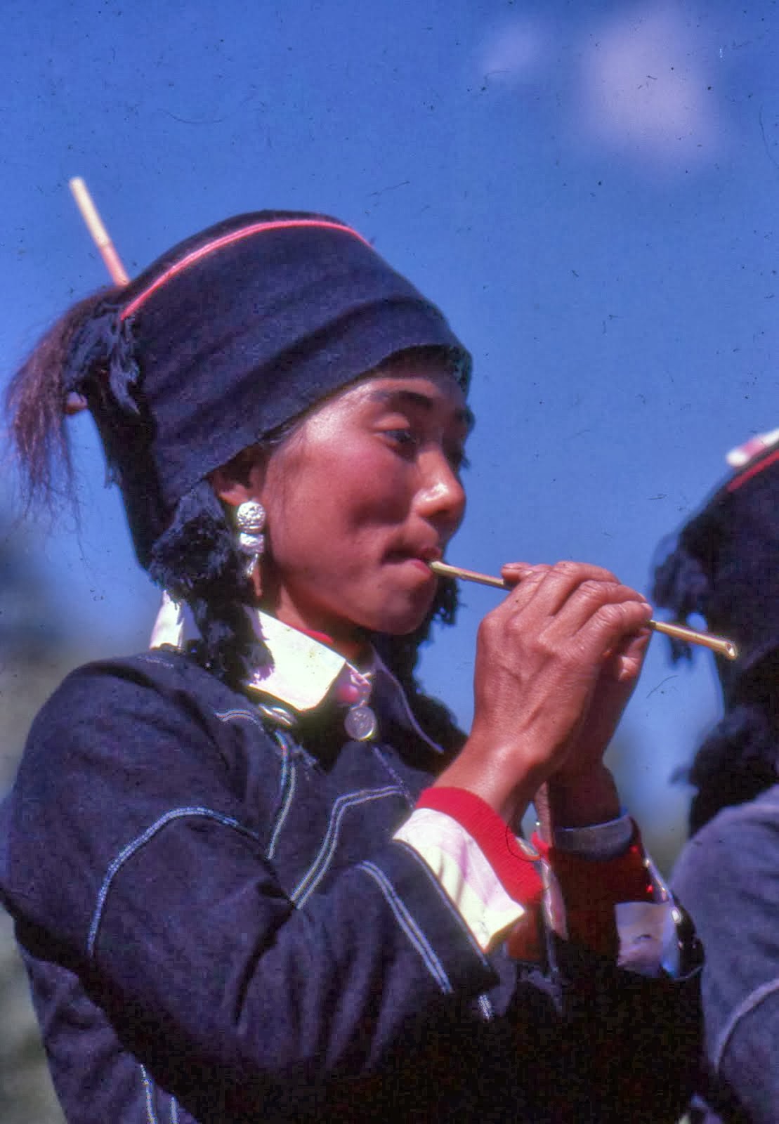 Hani girl on flute