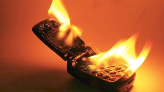 Selfish dickhead driver's phone bursting into flames after being zapped!