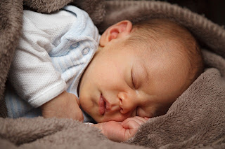 Image: Newborn Sleeping, by Vera Kratochvil