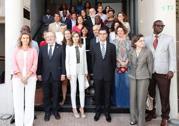 Queen Letizia wore Carolina Herrera blouse, Hugo Boss pantsuit at Spanish Cooperation Agency in Dakar