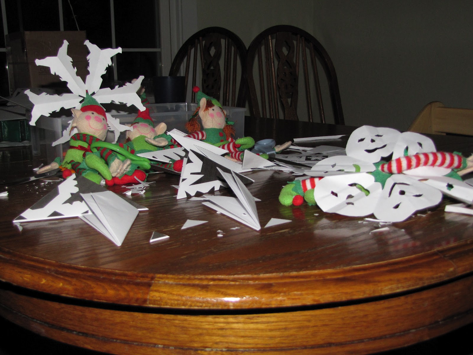 Elf on the Shelf of the Great Lakes Bay Elf Prank Day 2 Paper Snowflakes