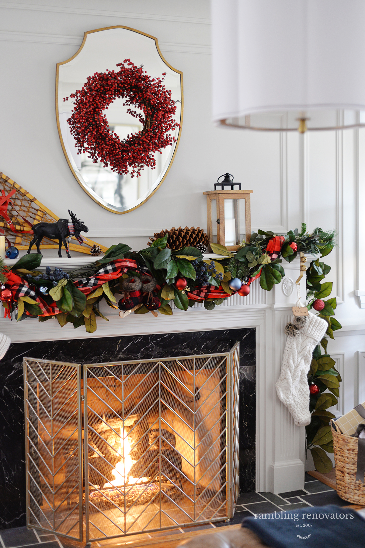 christmas fireplace mantel garland with blue and red rustic accents